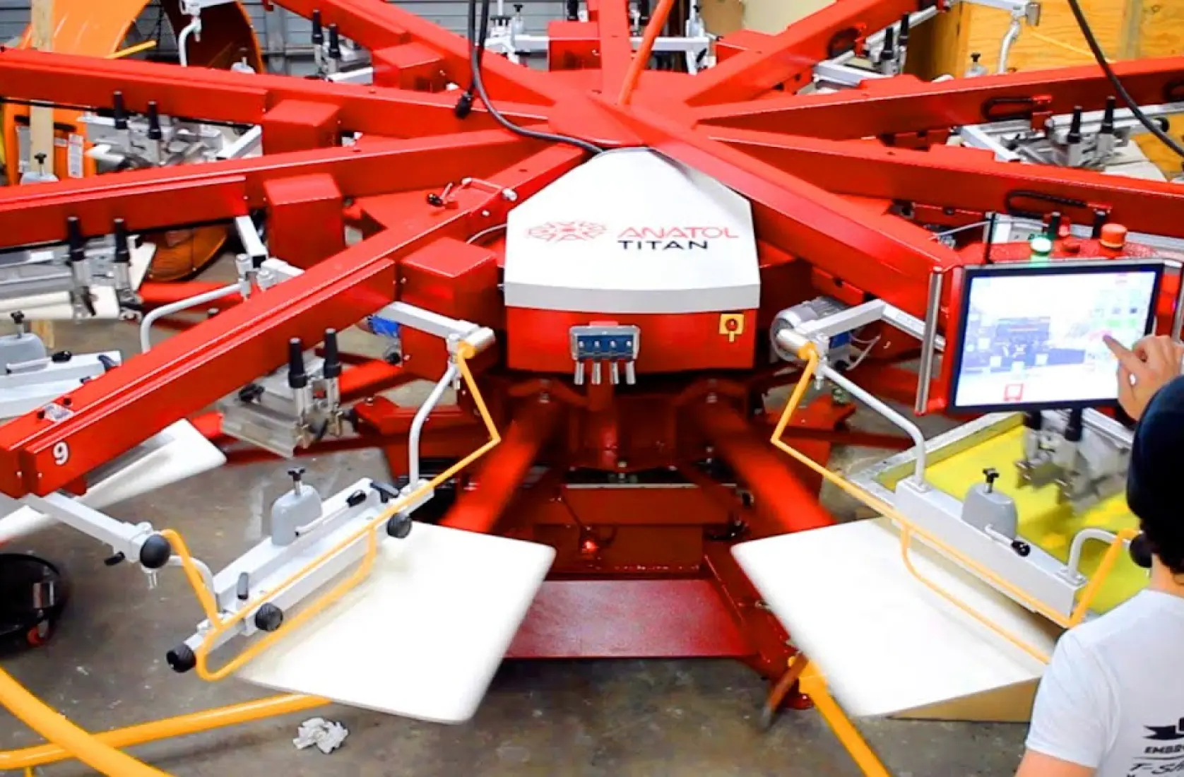 An overhead view of a factory with many machines.